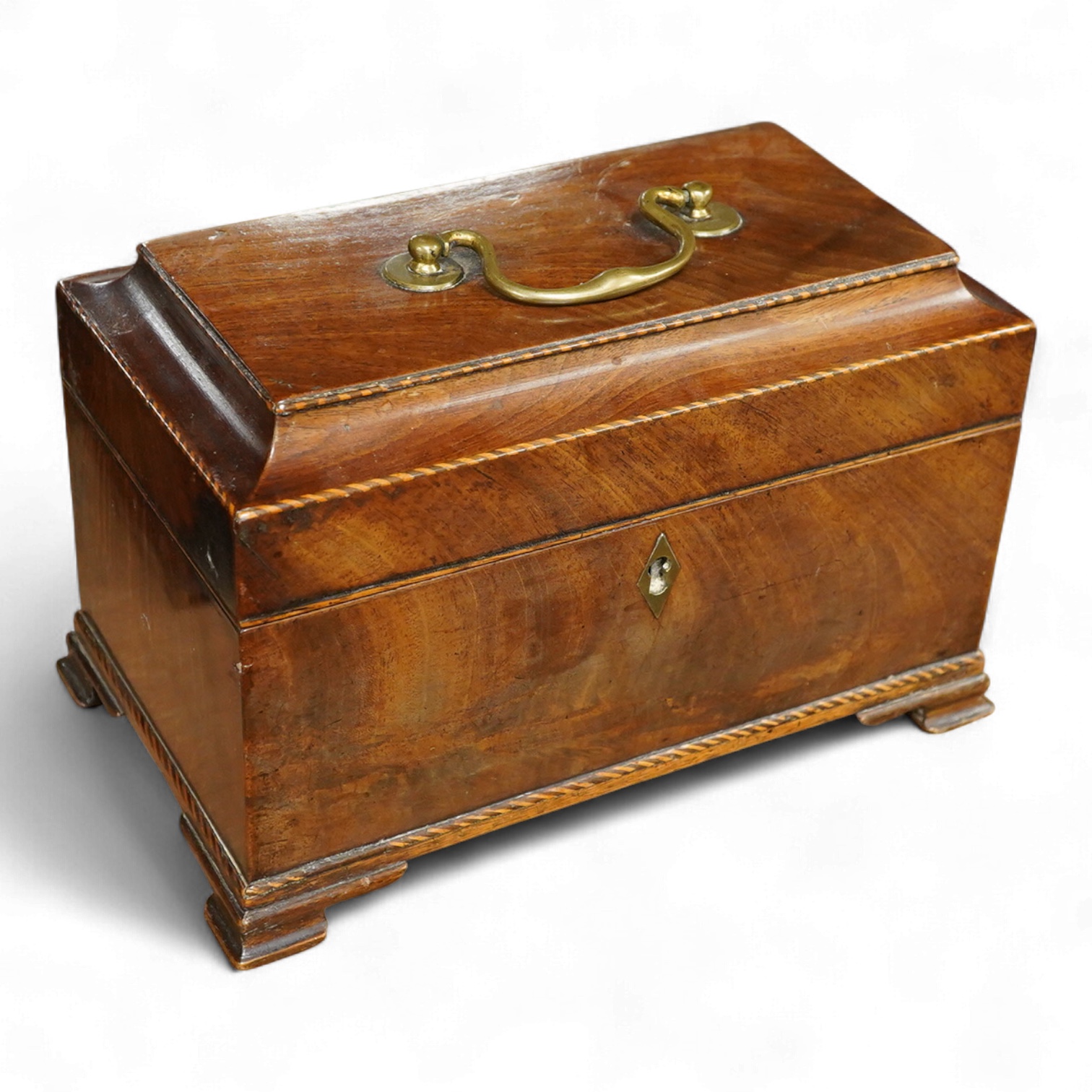 A George III mahogany tea caddy, containing tinned metal canisters, 25cm wide